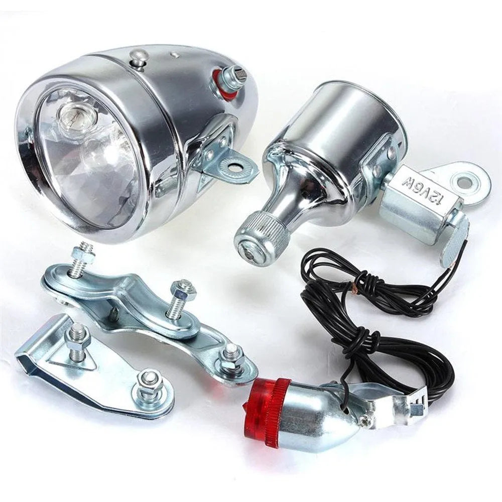 Silver bicycle dynamo generator light modification kit showing mounting bracket and wiring connections