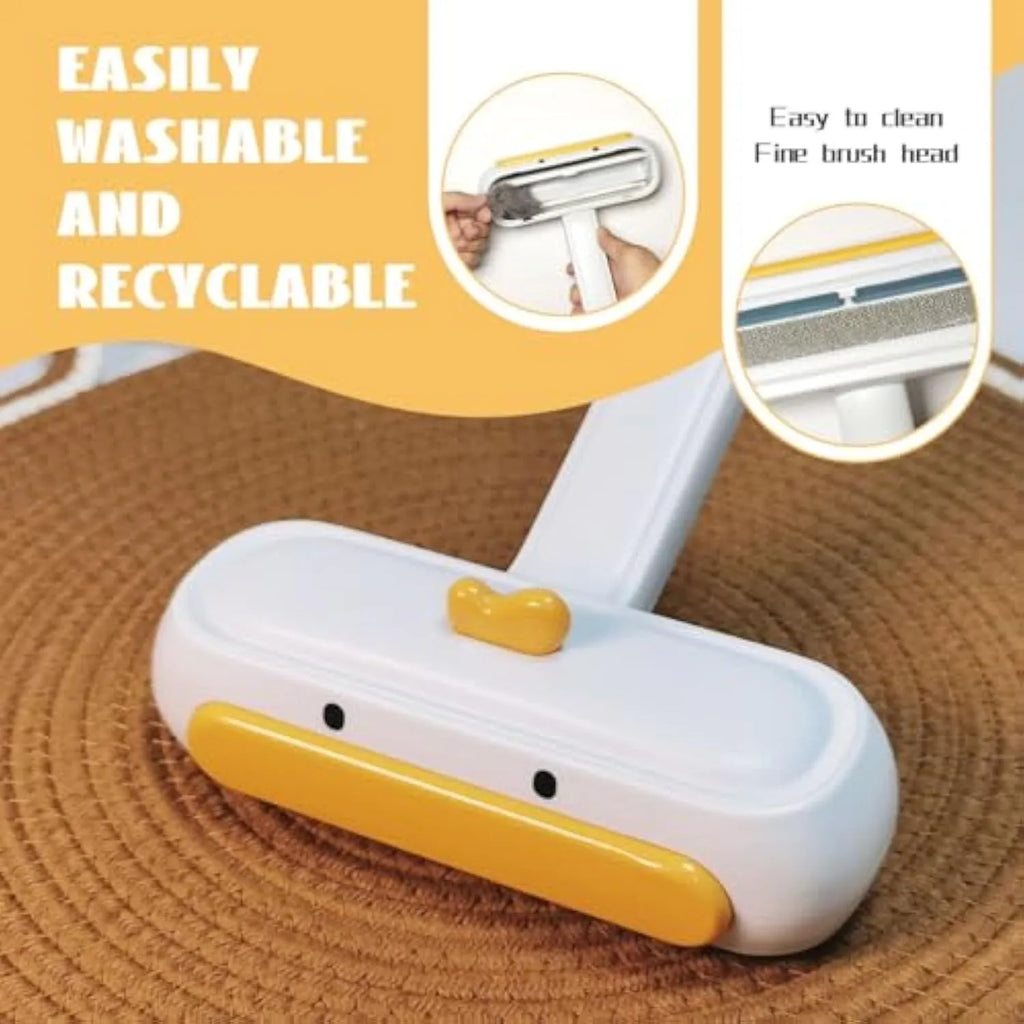 Yellow duck design portable pet hair remover with plastic body and polyester bristles.
