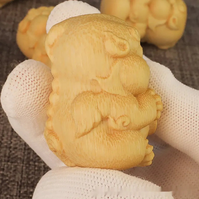 Solid bamboo carving ornament shaped as a traditional Money Toad, measuring 4.5cm in height.
