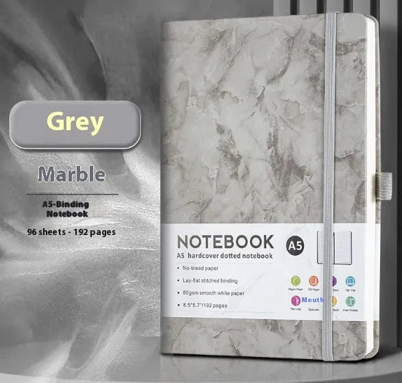 A5 soft touch PU leather strap diary open showing lined pages, closed with elastic band, in a choice of colours.