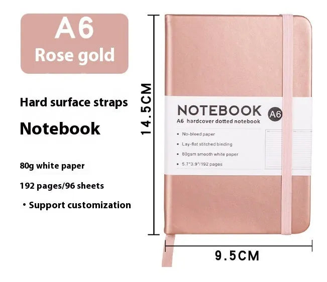 A5 soft touch PU leather strap diary open showing lined pages, closed with elastic band, in a choice of colours.