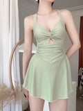 Women's holiday boxer swimsuit in solid colours with backless one-piece design
