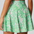 Women's high waist half-length sports skirt in blue, shown for golf or tennis wear.