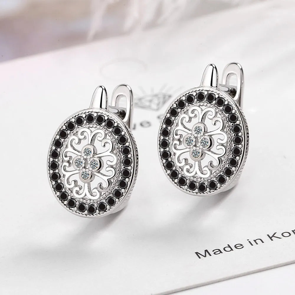 Diamond-encrusted round small ear clip earrings for women copper plated platinum finish geometric shape