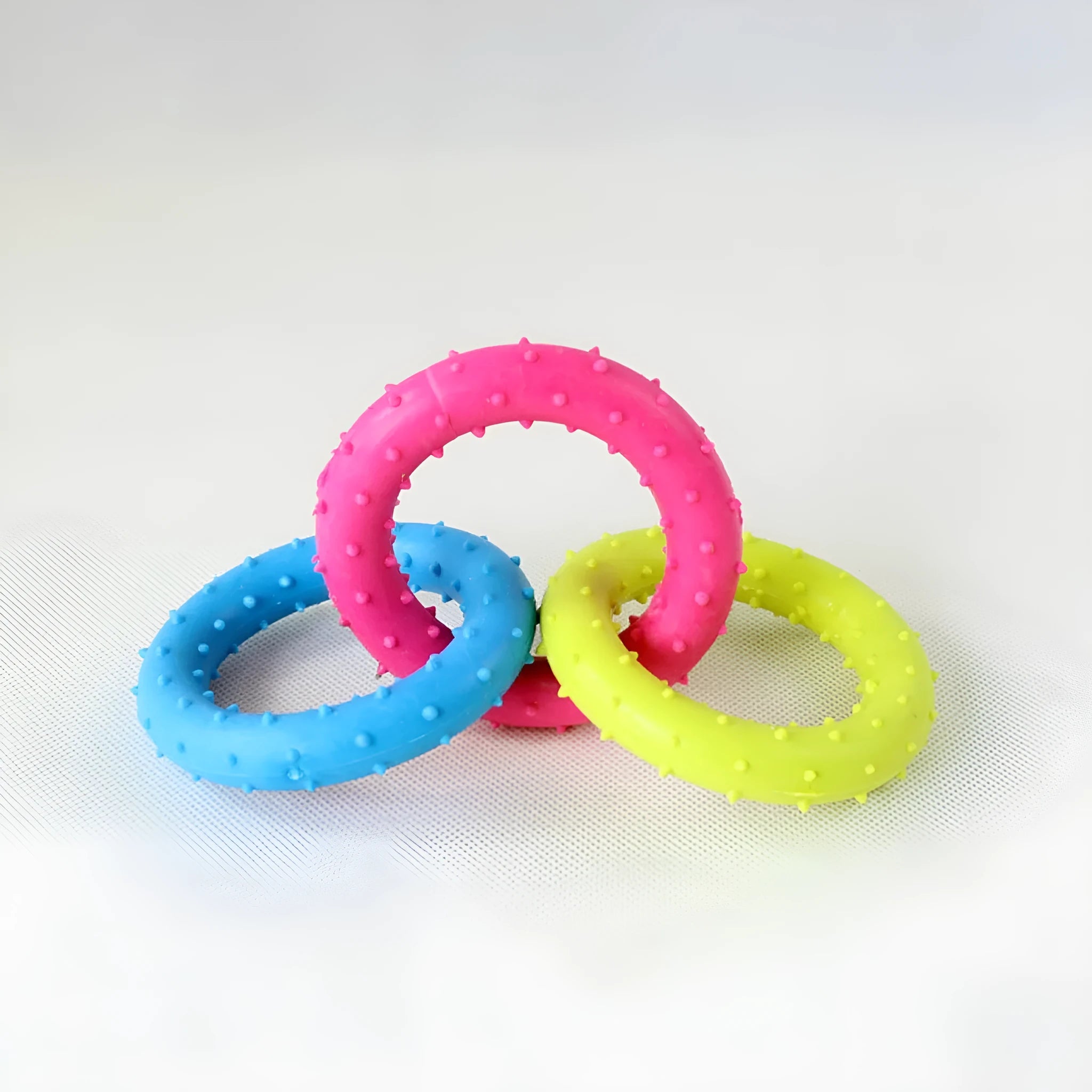 TPR rubber dog chew toy with three interlocking chains for aggressive chewers