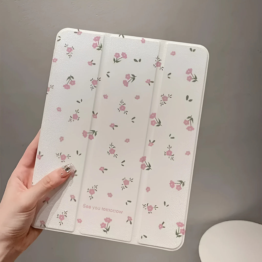 Transparent floral tri-fold protective case for Apple iPad tablet showing clear front and built-in stand
