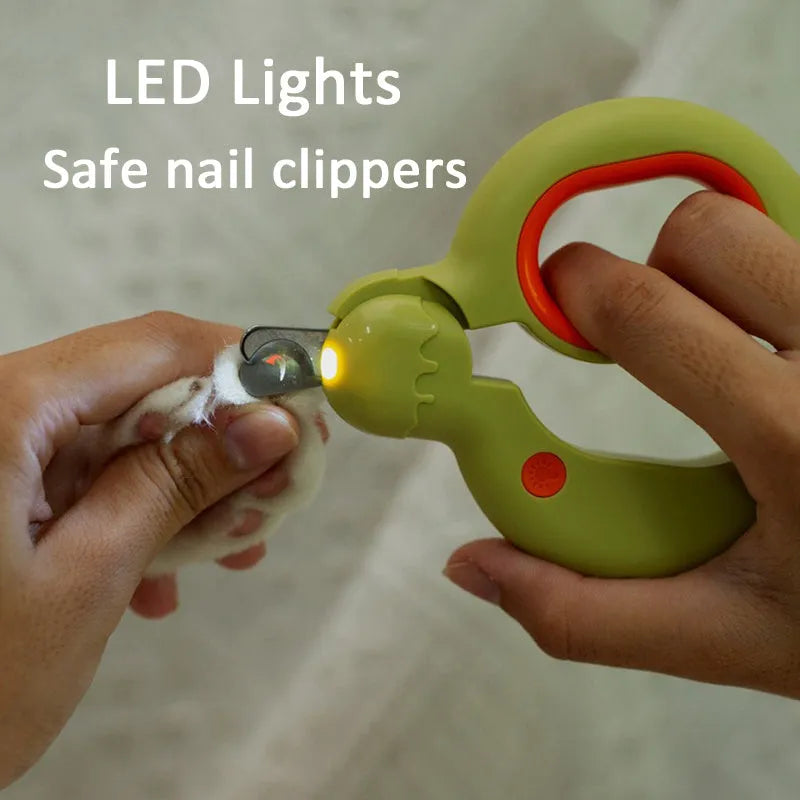 Blue pet nail clippers with LED light on handle for trimming cat and dog nails safely