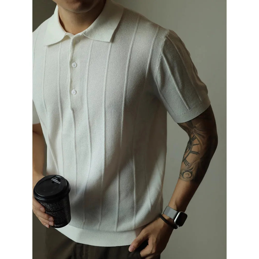 Men's loose fit solid colour polyester T-shirt on a hanger, shown in black and white colour options.