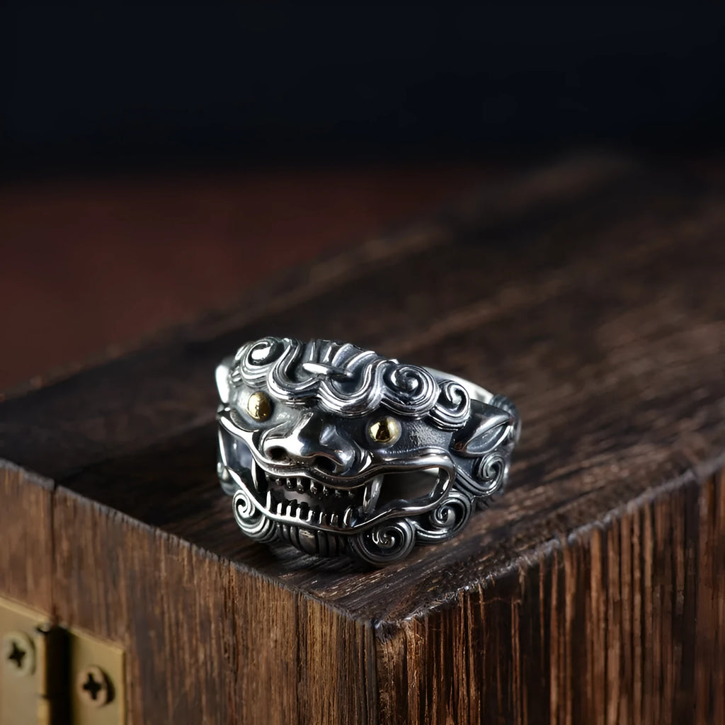 Silver open ring with detailed animal Jibeast pattern and geometric design