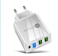 Black dual USB fast charger with LED indicator and UK plug attached