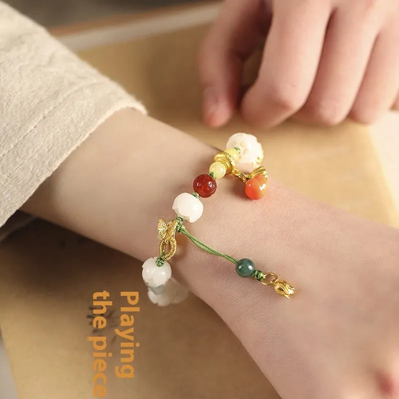 White jade Bodhi bracelet with lotus beads, pumpkin beads, and adjustable open rope design