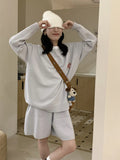 Women's casual knitted sweater and shorts suit with embroidery detailing and animal pattern