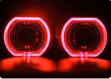 Black and silver vehicle angel eye mask light covers showing dual lens design and halo light effect.
