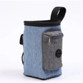 Portable pet outdoor training waist bag in blue, showing clip and elastic opening.