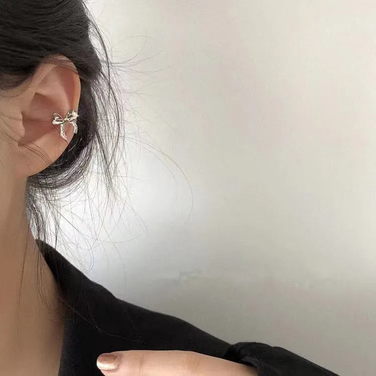 Silver bow earrings for women, copper electroplated, single ear clip and bow ear buckle single, cold wind style