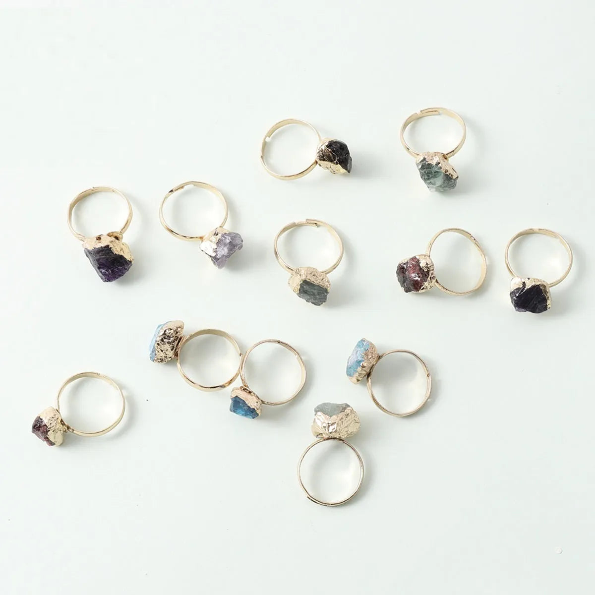 Natural rough stone open ring with gold-plated adjustable band, irregular crystal in amethyst colour
