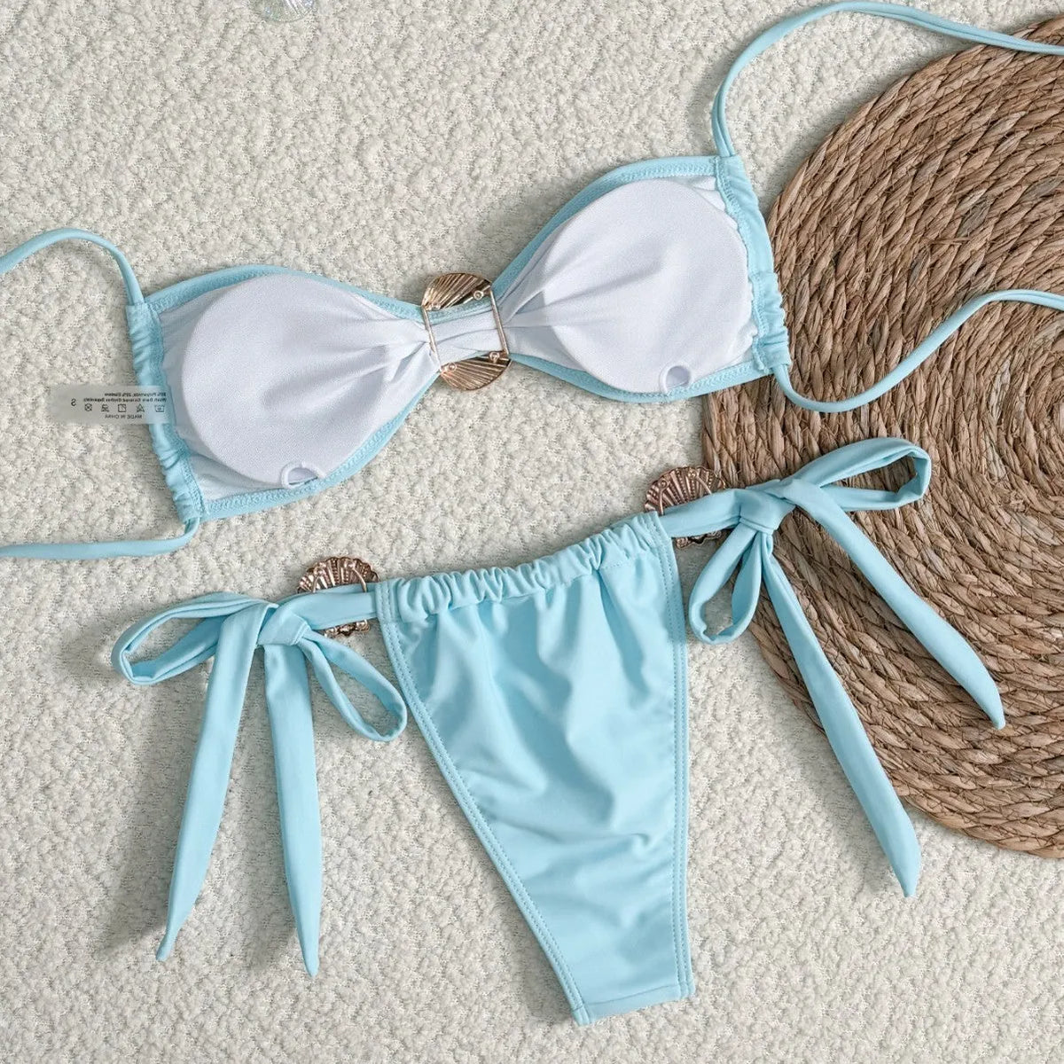 Women's high waist lace-up bikini swimsuit in solid blue polyester, front view, sizes S to XL