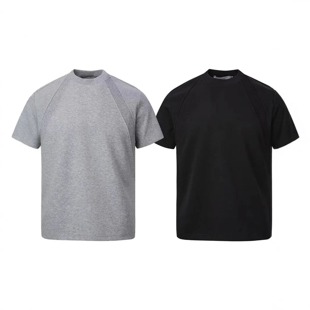 Loose fit short sleeve top with textured air layer stitching on polyester fabric.
