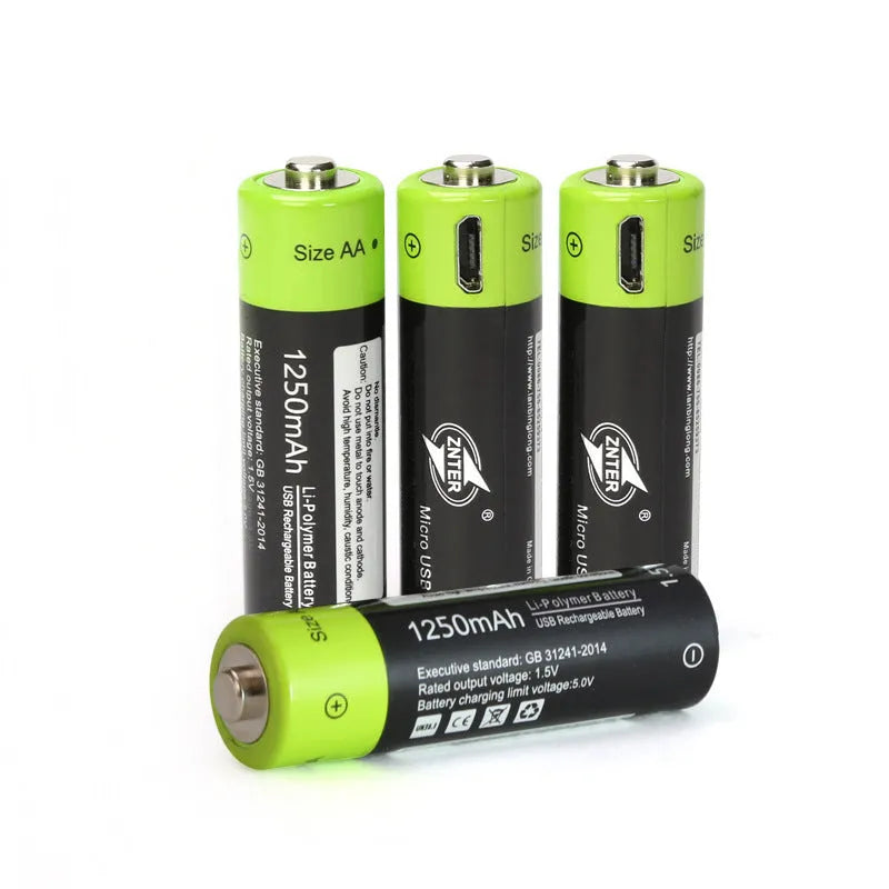 Four green USB rechargeable lithium AA batteries with a black charging cable on a white background