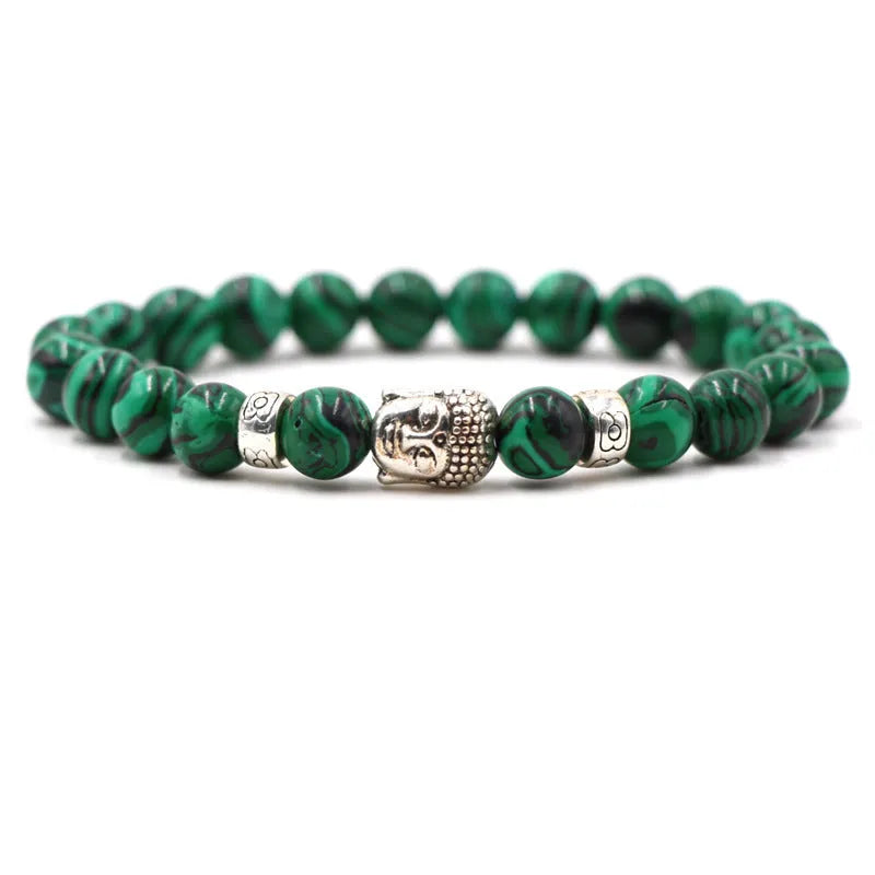 Tigereye stone Buddha head stretch bracelet with 8mm beads on a wrist.