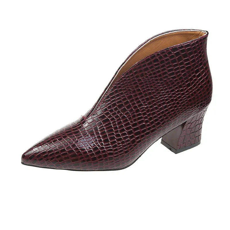 Women's black V cut pointed toe embossed Martin boots with chunky heel