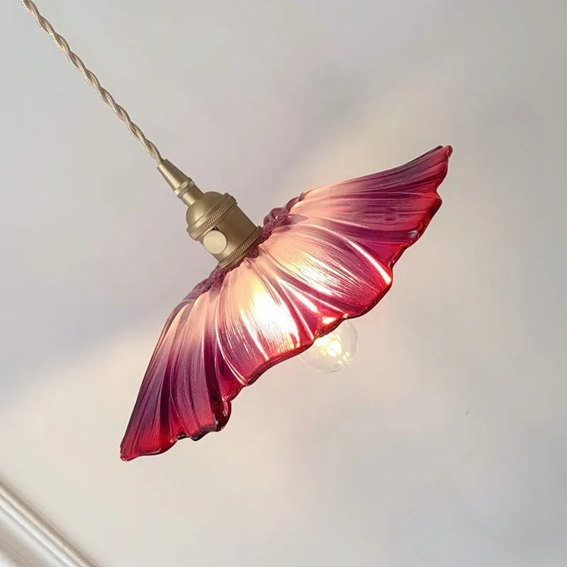 Nordic Japanese style lotus leaf shaped ceiling or pendant lamp with iron frame and glass shade.