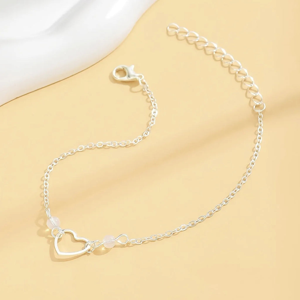 Gold or silver women's anklet with adjustable design and heart-shaped geometric pendant