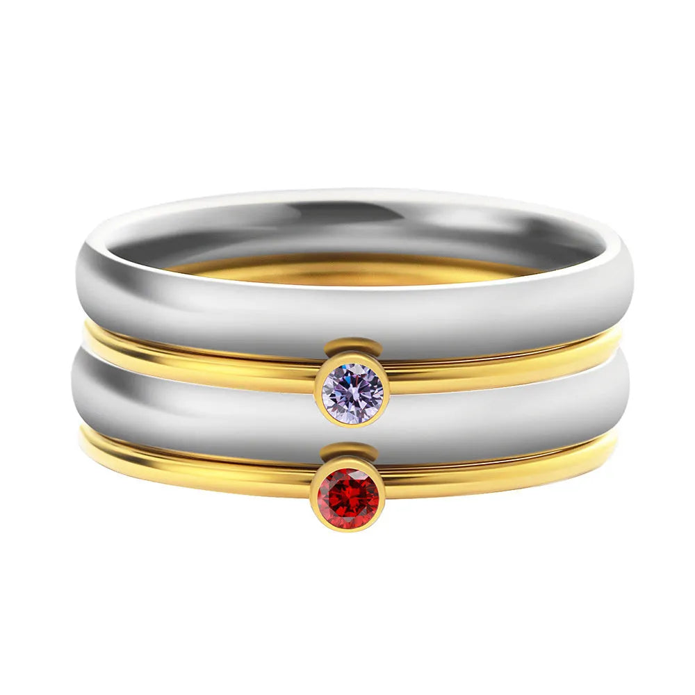 Titanium steel engraved ring with a December colour birthstone and geometric design.