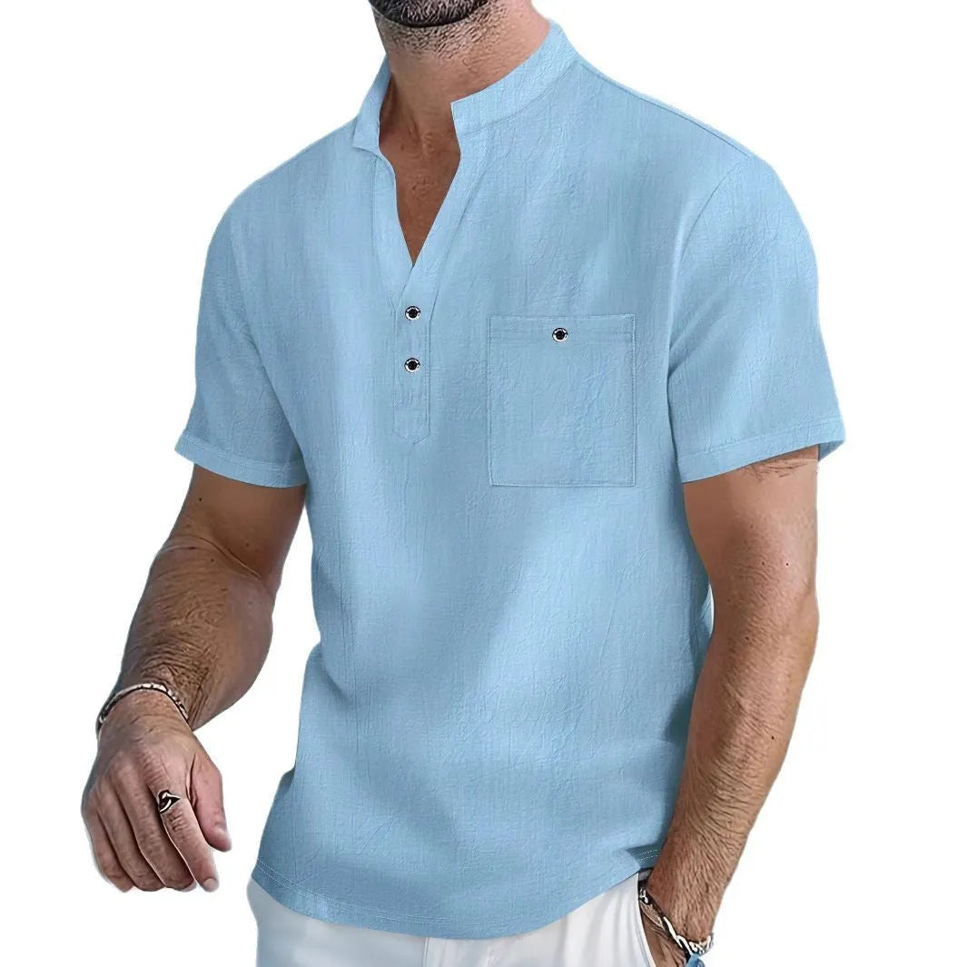 Men's loose-fit linen blend short sleeve shirt with a stand collar in a light blue colour.