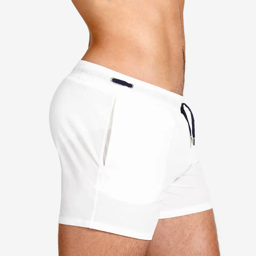 Mesh lining swimming sports shorts in polyester fabric available in six colours with size options