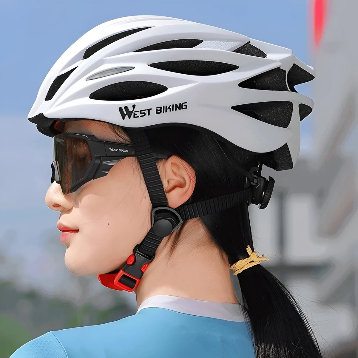 White bicycle helmet with integrated molding construction on display, size 54-62cm, PC and EPS materials