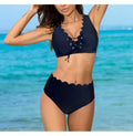 Women's solid colour polyester split swimsuit with gathering detail on a brief