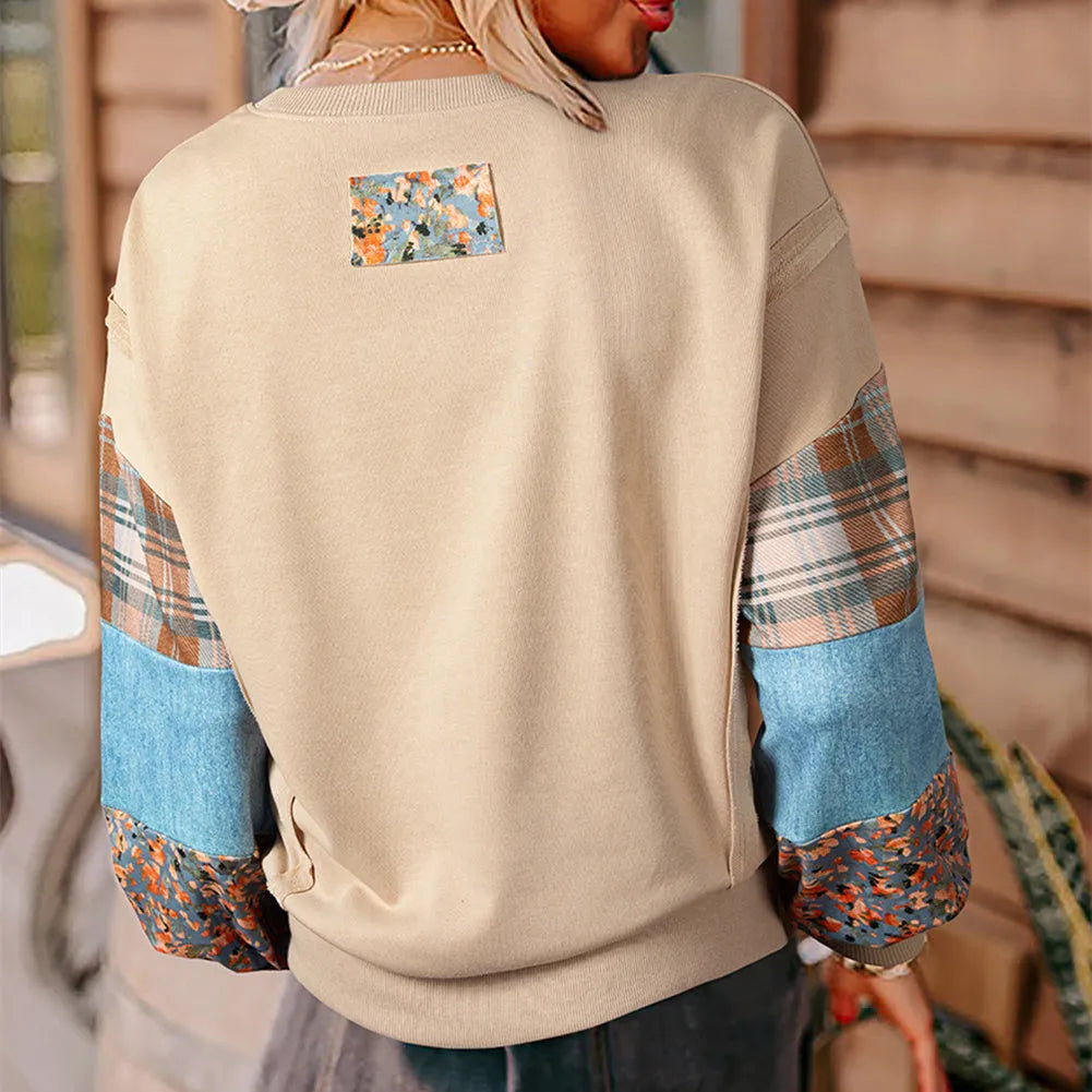 Women's loose fit long-sleeved top with plaid stitching in apricot colour.