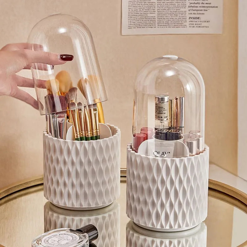White rotating acrylic makeup brush storage box with transparent dust cover on desktop