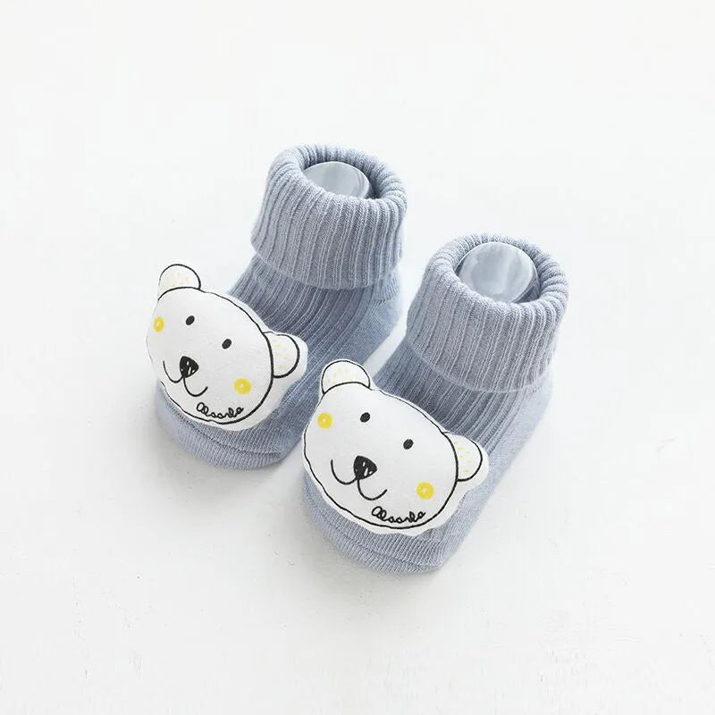 Children's combed cotton non-slip socks in multiple colours for sizes XS, S, and M.