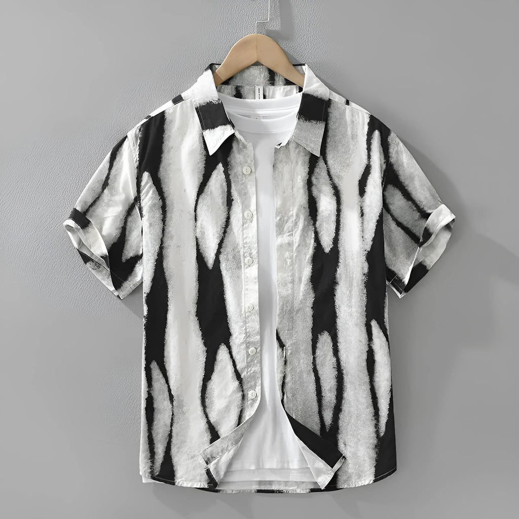 Retro striped short sleeve cotton cardigan in black, showing loose fit and button front.