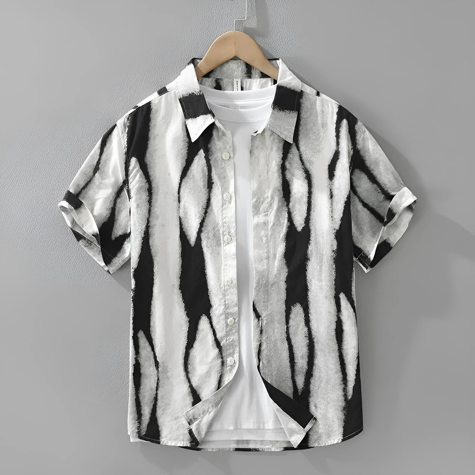 Retro striped short sleeve cotton cardigan in black, showing loose fit and button front.