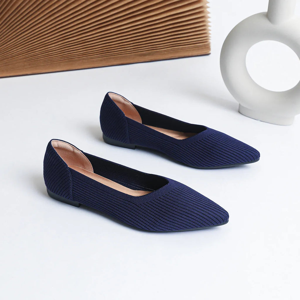 Women's knit flat pumps with pointed toe and rubber sole available in multiple colours