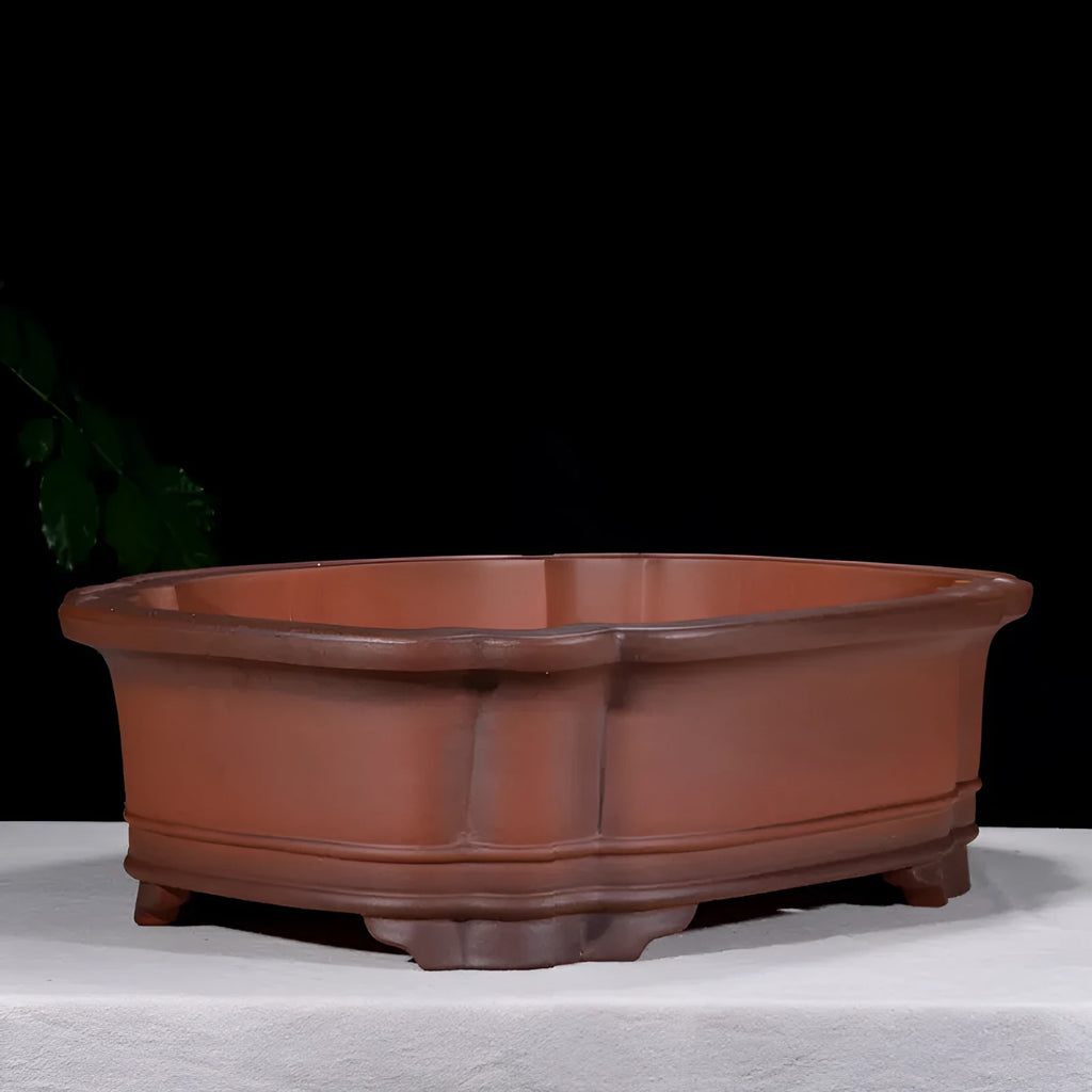 Antique finished rectangular purple clay flowerpot with detailed tree stump and floral relief carving.