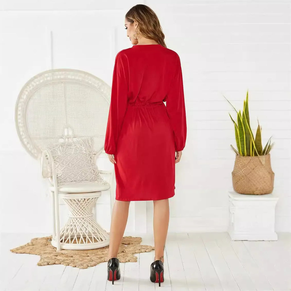 Black polyester A-line dress with an elastic waist, long sleeves, and a matching belt.
