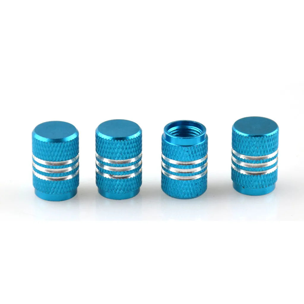 Set of stainless steel car tyre valve caps in multiple colours including red, blue, black, and silver.