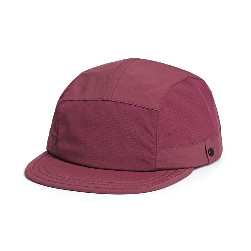 A breathable dome cap with a soft tongue, shown in an available colour like army green or wine red.