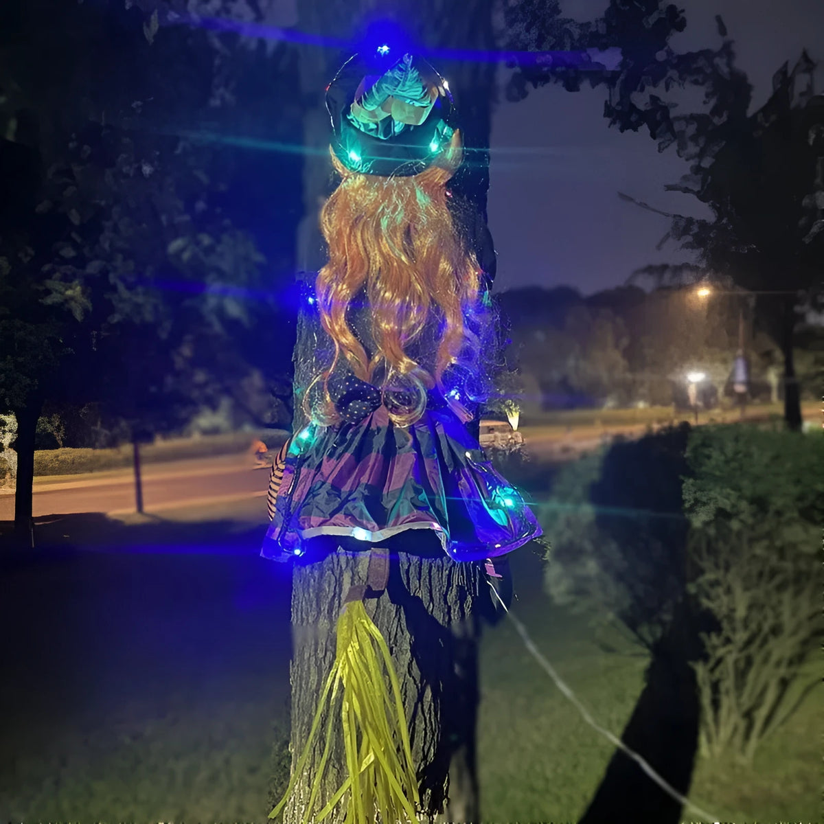 Witch cloth pendant light with warm white glow and string of lights for outdoor courtyard decoration