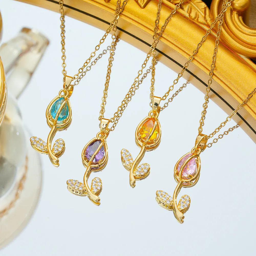 Zircon tulip pendant necklace for women in gold tone on a titanium steel chain.