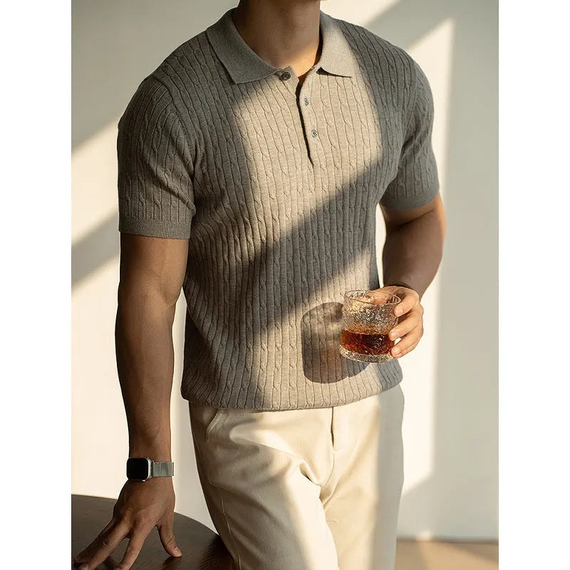 Men's khaki short sleeve business casual top on a hanger