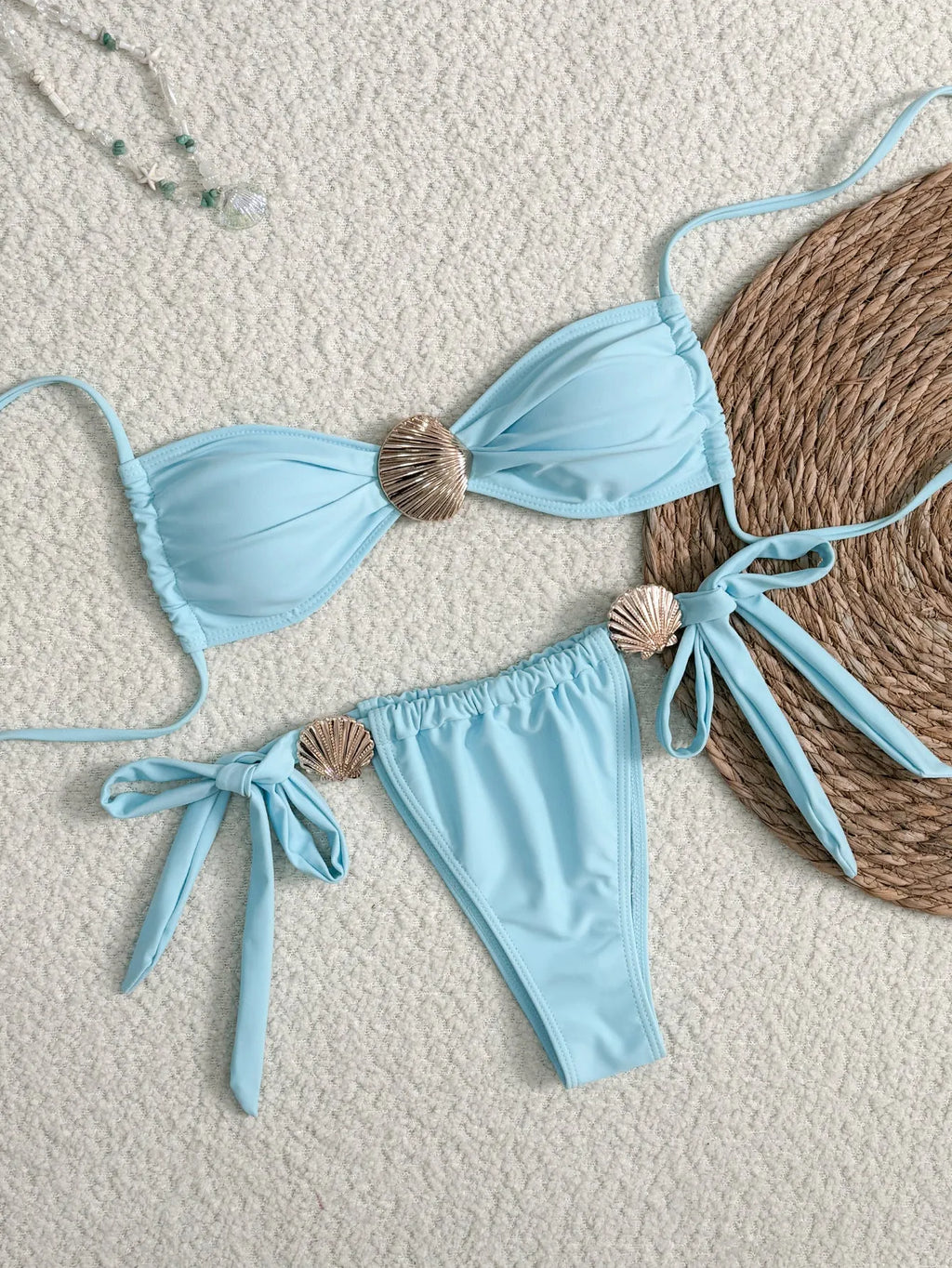 Women's high waist lace-up bikini swimsuit in solid blue polyester, front view, sizes S to XL
