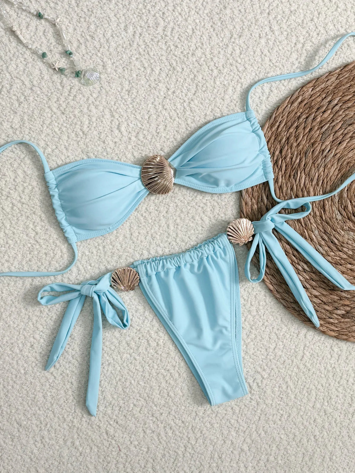 Women's high waist lace-up bikini swimsuit in solid blue polyester, front view, sizes S to XL
