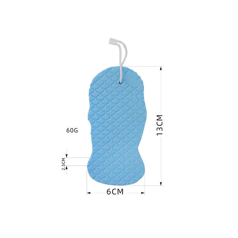 White 3D bath sponge with fish scale pattern for gentle body exfoliation in shower.