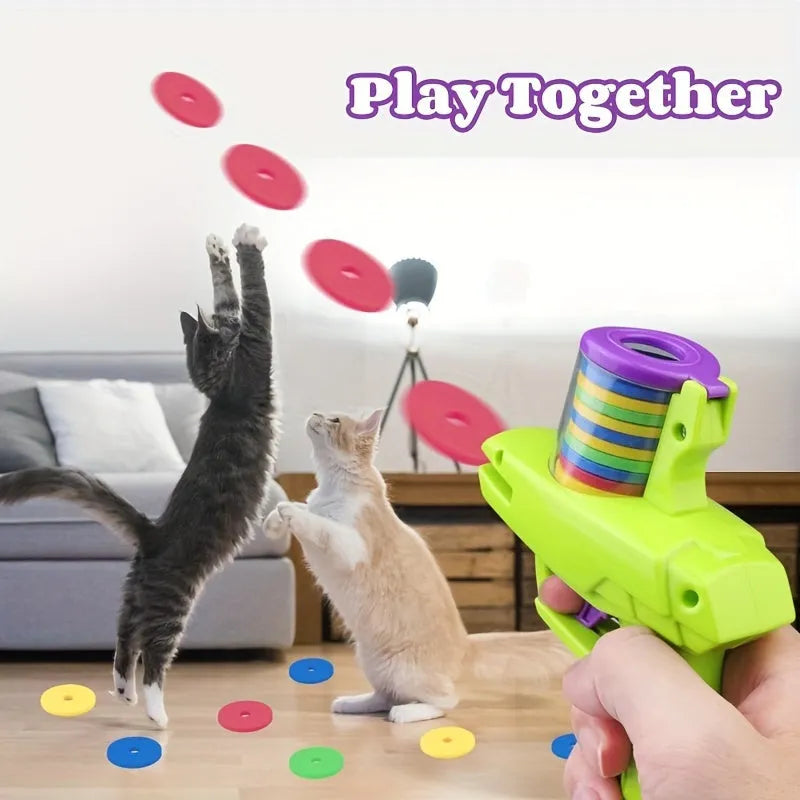 Green and purple battery-free interactive cat toy launcher with foam disc