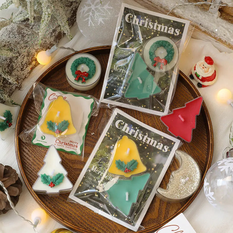 Hand-poured Christmas tea wax candle in cup shape with soy wax blend, available in tree, bell, moon, and leaf designs.